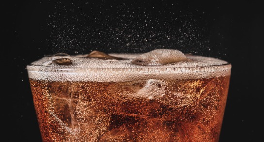 close-up-ice-cola-in-glass-and-bubble-soda-splashing-on-black-picture-id858867994 (1) carbonation